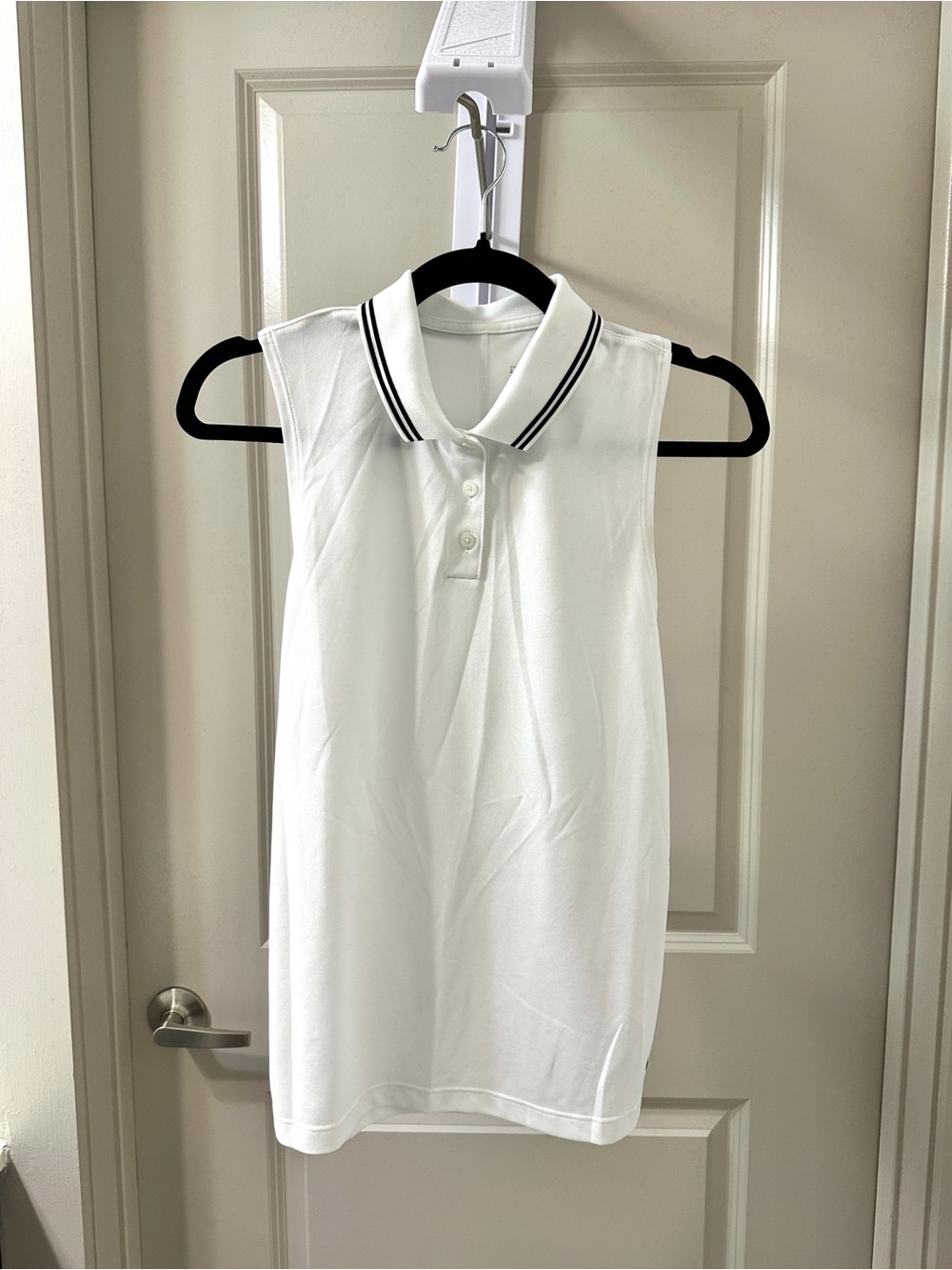 Nike Sleeveless White Polo Top with Black Contrast Trim